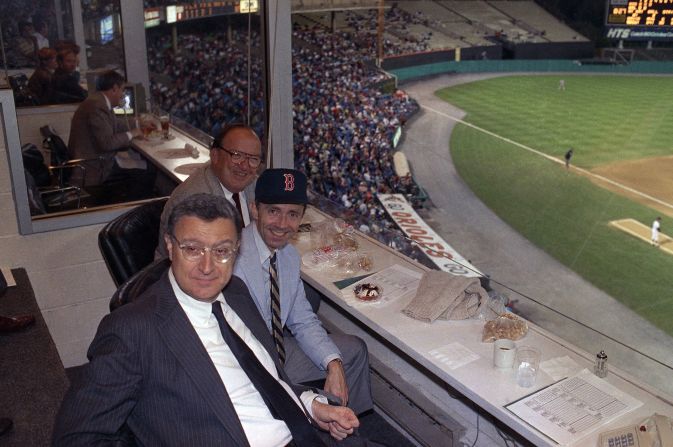 Souter wears a Boston Red Sox hat as he watches the baseball team play a game in Baltimore in September 1990. With him are Major League Baseball Commissioner Fay Vincent, top, and Baltimore Orioles President Eli Jacobs.