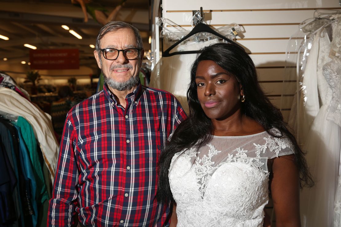 Vee Aronds, 55, right, and Frederick Stewart, 75, shop at Unclaimed Baggage, where Aronds tried on a wedding dress.