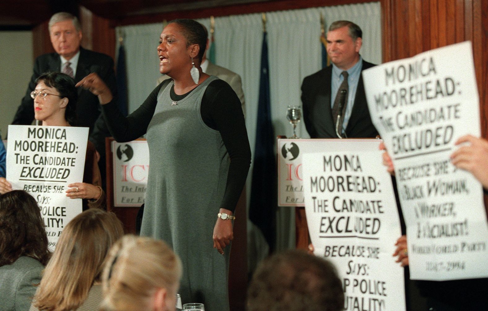 Monica Moorehead, a presidential candidate from the Workers World Party, disrupts a presidential debate in Washington, DC, in 1996. She and her supporters walked in front of the participants and complained about her exclusion.