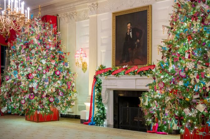 A portrait of President Abraham Lincoln hangs in the State Dining Room. Jill Biden invited families of the USS Delaware and the USS Gabrielle Giffords to provide the colorful paper chain garlands hanging throughout the room.