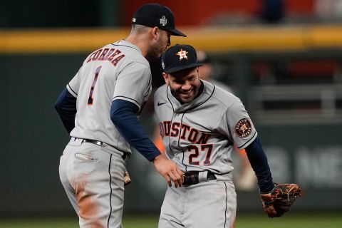 Houston Astros shortstop Carlos Correa and second baseman Jose Altuve celebrate winning Game 5 of the World Series.