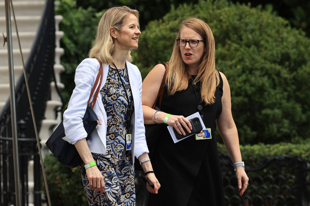 In this July 2021 photo, White House Deputy Chief of Staff Jennifer O'Malley Dillon, right, departs the White House.