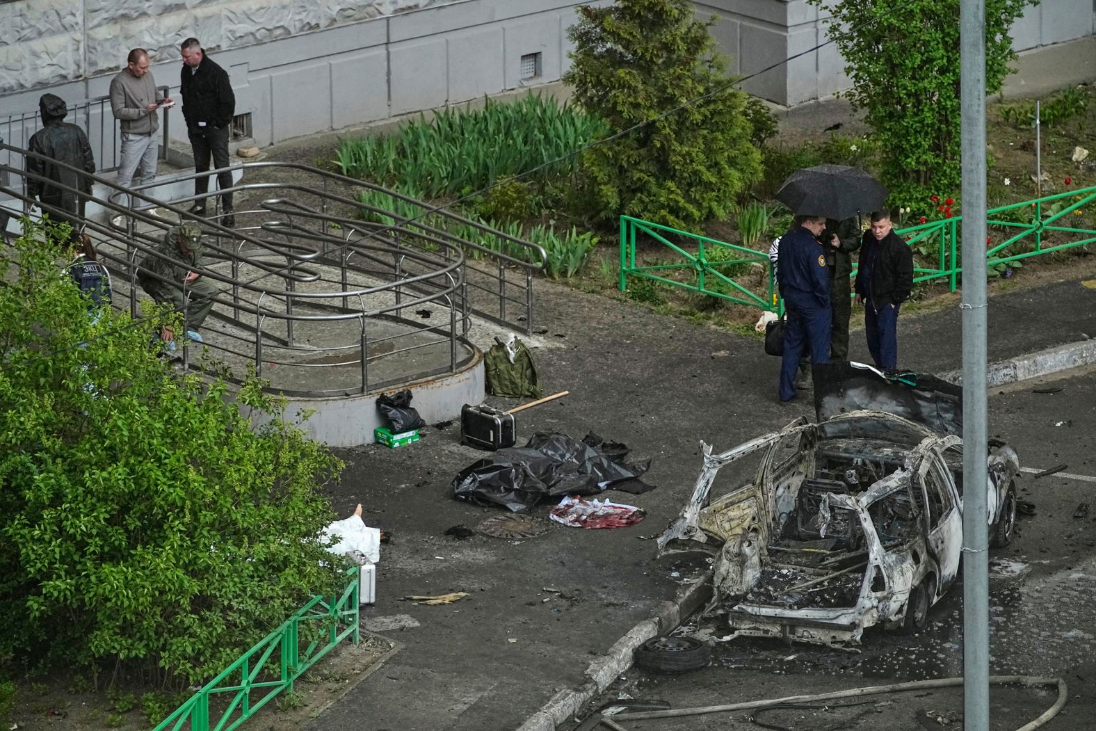 Security personnel work at the scene where Russian General Yaroslav Moskalik was <a href="https://www.cnn.com/2025/04/26/europe/russia-general-bombing-suspect-detained-intl-latam/index.html">killed in a car explosion</a> in Balashikha, Russia, on Friday, April 25. Russian authorities said they had charged a “Ukrainian special services agent” with terrorism after he was detained in connection with the attack.