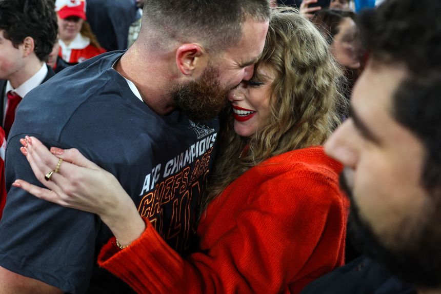 Travis Kelce celebrates with Taylor Swift after the Kansas City Chiefs defeated the Baltimore Ravens in 2024.