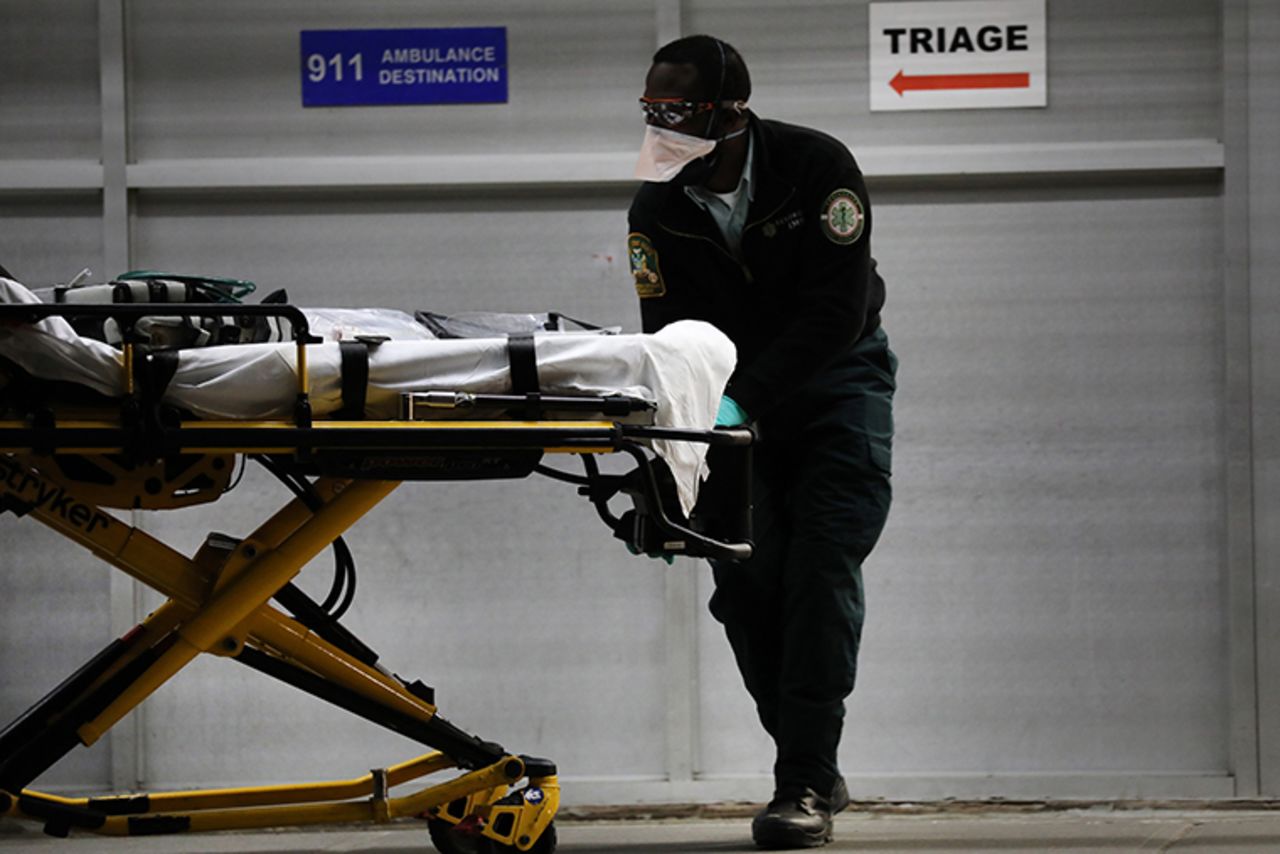 Medical workers take in patients outside a special coronavirus area at Maimonides Medical Center on May 06, in the Borough Park neighborhood of Brooklyn in New York City. 