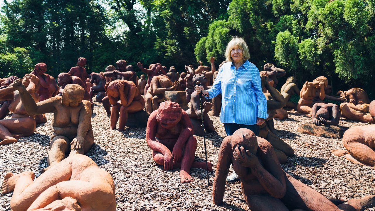 Suse Lowenstein stands amongst her piece Dark Elegy.