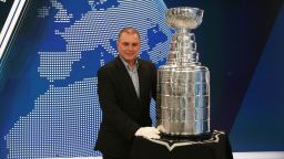 Howie Borrow poses with the Stanley Cup.