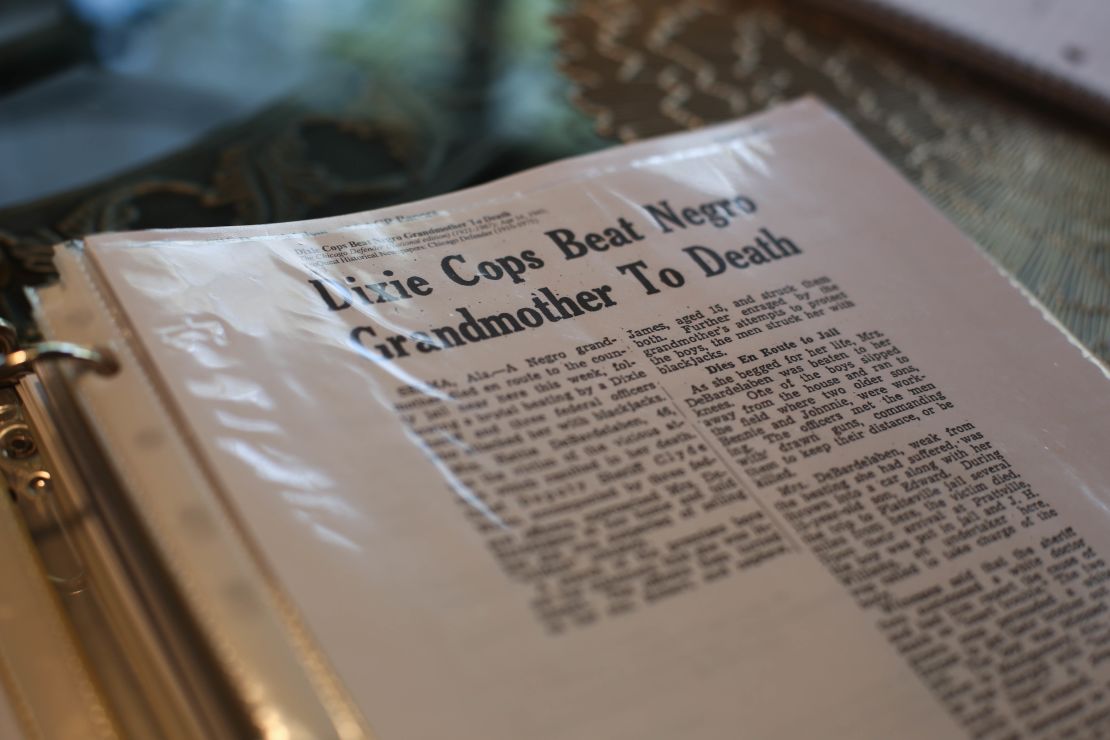 Mary DeBardelaben keeps a binder of everything she's learned about her grandmother, including this March 1945 newspaper story about her killing.