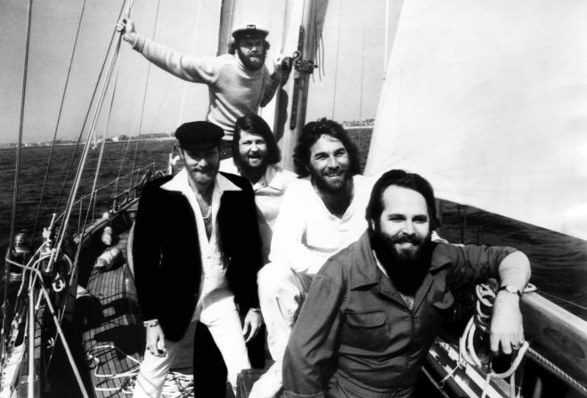 The Beach Boys on a boat in 1978. From left, in front, are Love, Brian Wilson, Dennis Wilson and Carl Wilson. Jardine is in the back.