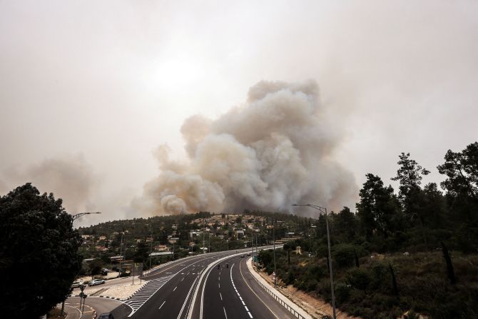 Wildfire smoke rises near Latrun, Israel, on Wednesday, April 30. <a  target="_top" href="/newspapers?url=https://www.cnn.com/2025/04/30/middleeast/israel-wildfires-jerusalem-intl/index.html">Wildfires forced evacuations in several areas</a> and led to several major road closures.