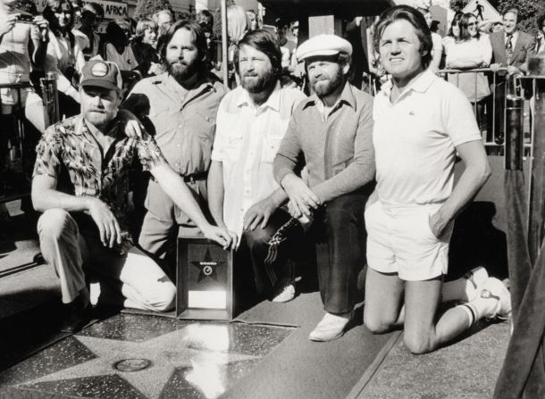 The Beach Boys receive a star on the Hollywood Walk of Fame in 1980. From left are Love, Carl Wilson, Brian Wilson, Jardine and Johnston.