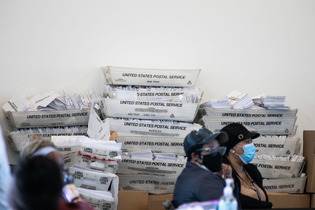 Security envelopes for absentee ballots sit in boxes as Fulton county workers continue to count absentee ballots at State Farm Arena on November 6 in Atlanta, Georgia. 