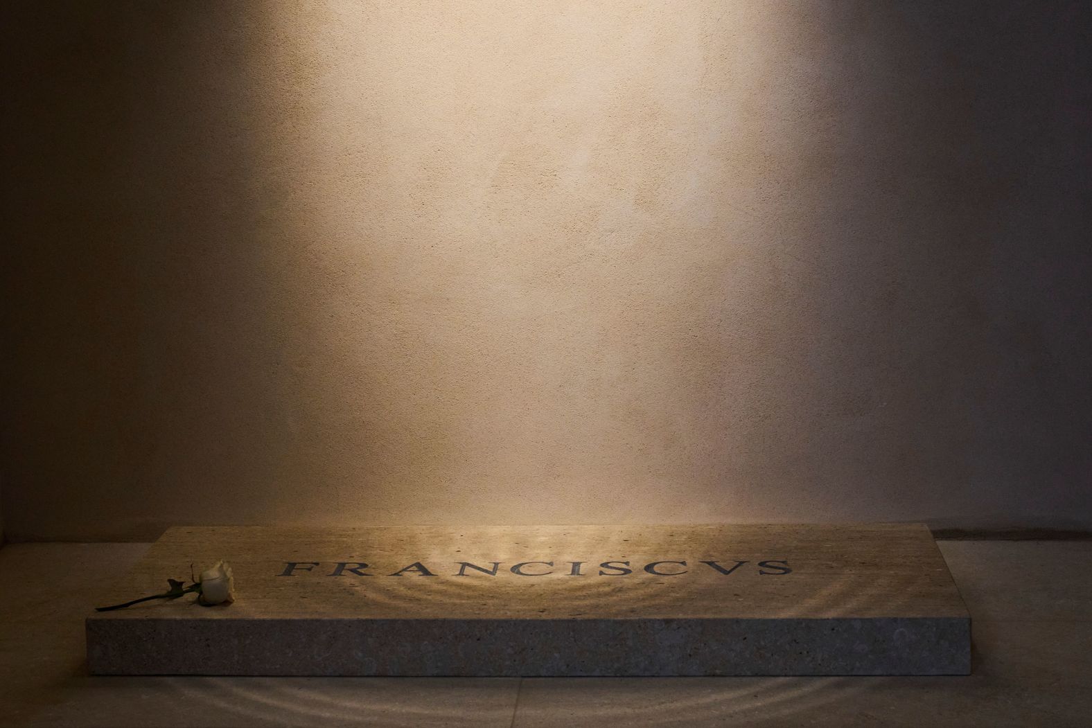 A white rose is placed on the tomb of Pope Francis in Rome on Monday, April 28. Popes are usually buried within Vatican City, beneath St. Peter’s Basilica. But Francis is <a href="https://www.cnn.com/2025/04/25/europe/pope-francis-burial-santa-maria-maggiore-intl/index.html">the first pontiff in more than a century to be buried outside the Vatican</a>. He requested a “simple” tomb a couple of miles away at the Basilica di Santa Maria Maggiore — also known as St. Mary Major. The church has long held a special significance for Francis, who used to visit on Sunday mornings to honor the Virgin Mary.