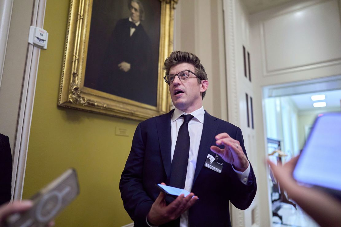 Fossil fuel advocate Alex Epstein speaks to reporters after participating in a briefing with Senate Republicans and White House chief of staff Susie Wiles on Capitol Hill in June.