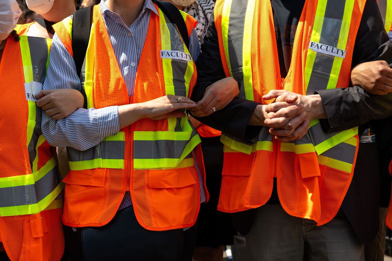 Columbia faculty members protect students in the Pro-Palestinian "Gaza Solidarity Encampment" in the West Lawn of Columbia University on April 29, 2024.