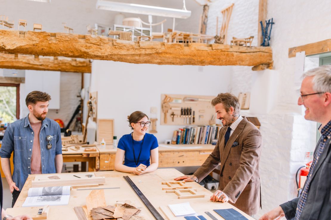 Beckham visited students at the Snowdon School of Furniture, one of The King's Foundation's specialist workshops.