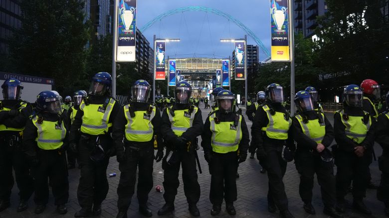 Police outside the UEFA Champions League final at Wembley Stadium in London. The Metropolitan Police have made 53 arrests around the Champions League final at Wembley, as some football fans tried to force their way into the stadium and others invaded the pitch. A large proportion of the arrests were made for attempts to breach security but five were made after people got on to the grass, the force said. Picture date: Saturday June 1, 2024.