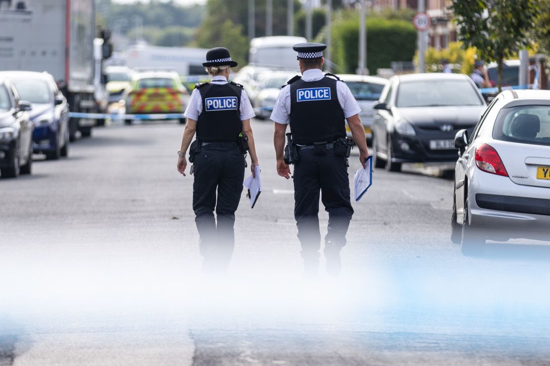 Police officers near the scene of a knife attack in Hart Street, Southport, on Tuesday, July 30, 2024.