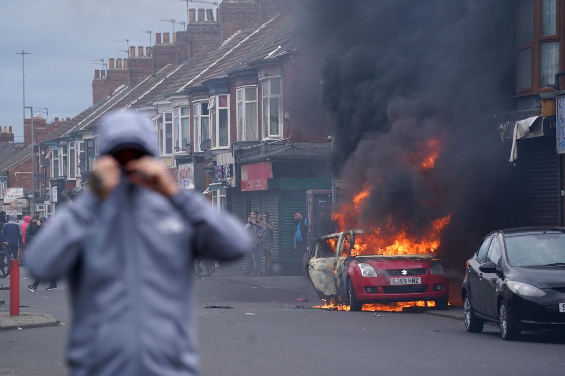 A car burns during an anti-immigration protest in Middlesbrough on Sunday.