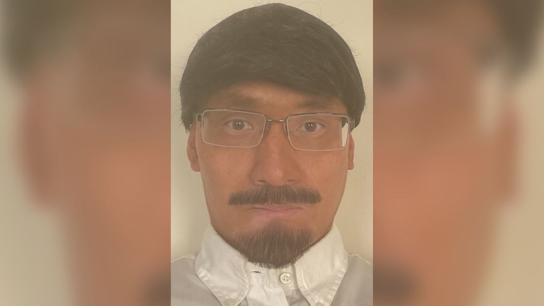 This undated handout photo of Thomas Kwan wearing a disguise was found on his computer and had been used to make a fake ID card.