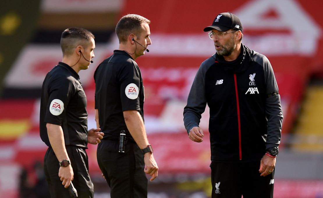 Former Liverpool manager Jurgen Klopp (right) has previously criticized Coote (center).