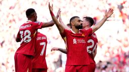 Liverpool's Mohamed Salah (centre) celebrates scoring their side's fourth goal of the game with team-mates during the Premier League match at Anfield, Liverpool. Picture date: Sunday April 27, 2025.