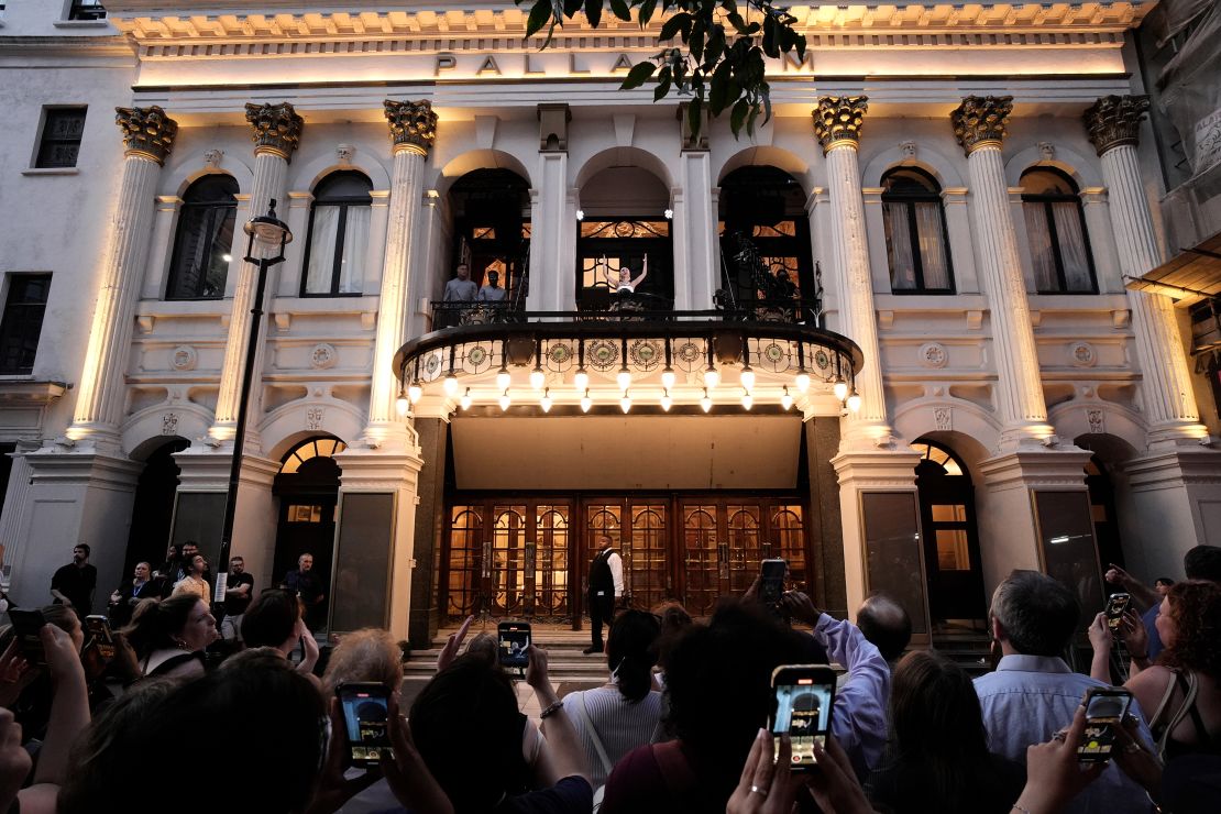 Hundreds of people gather outside the theater for every performance.