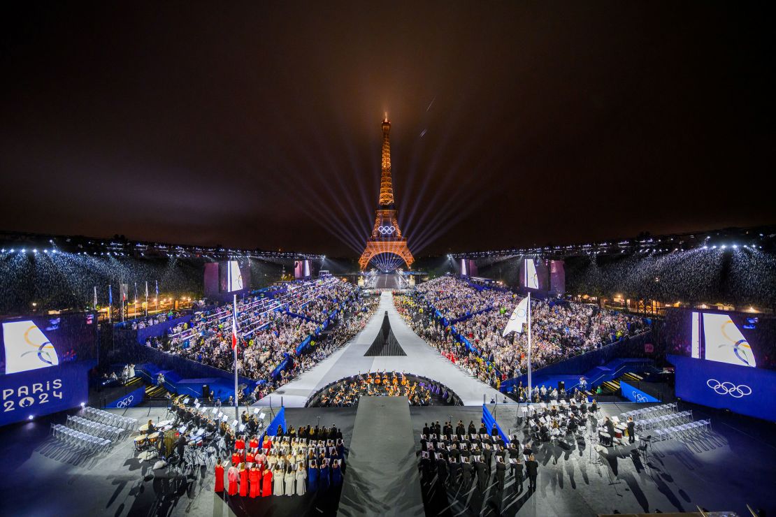 The Olympic flag is raised during the opening ceremony of the Paris Olympics on July 26, 2024.