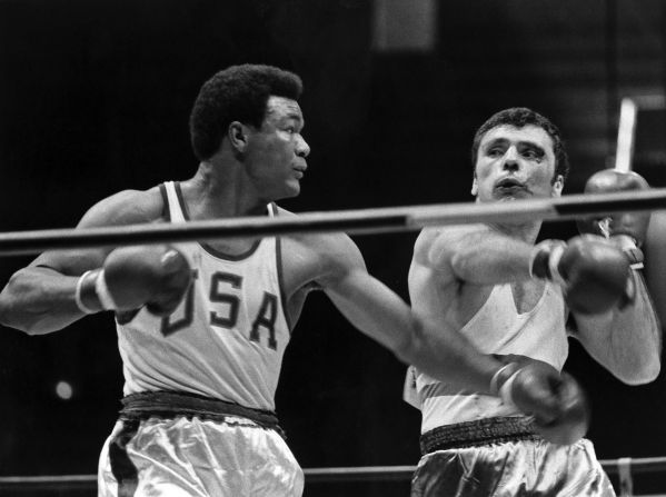 Foreman boxes Romania's Ion Alexe at the Summer Olympics in 1968. Foreman went on to win the gold medal in the heavyweight division.