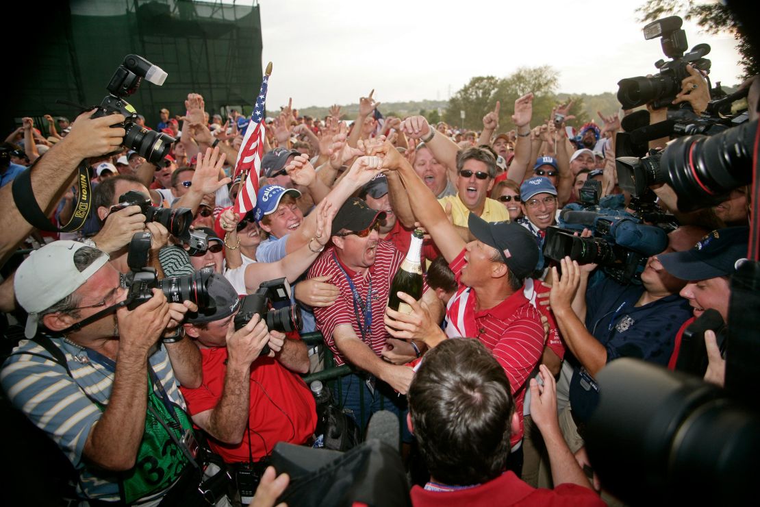 A jubilant Kim celebrates Team USA's 2008 Ryder Cup victory with fans.
