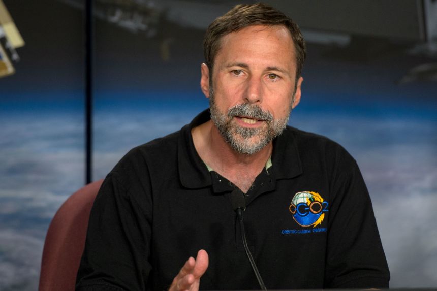 Dave Crisp speaks during an Orbiting Carbon Observatory-2 briefing in June 2014.