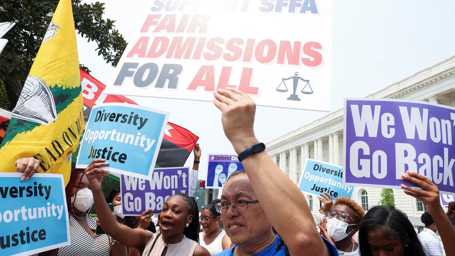 Demonstrators for and against the U.S. Supreme Court decision to strike down race-conscious student admissions programs at Harvard University and the University of North Carolina confront each other, in Washington, U.S., June 29, 2023.