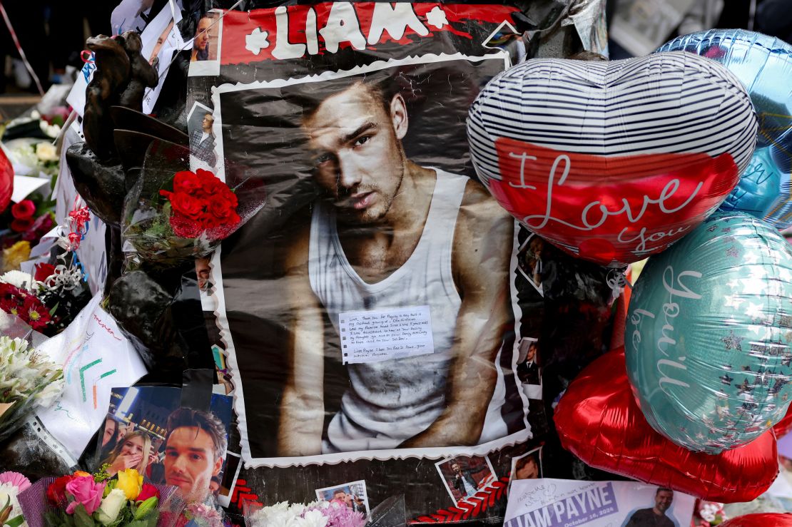 Tributes placed at a memorial for former One Direction singer Liam Payne at London's Hyde Park on Sunday.