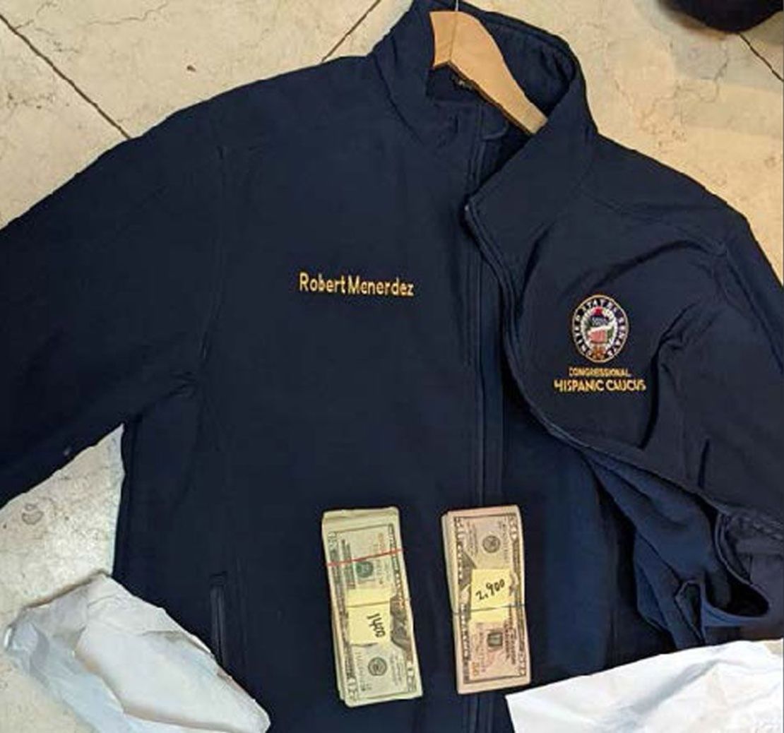 Prosecutors included this photo of a jacket bearing Menendez's name underneath stacks of $20 and $50 bills.