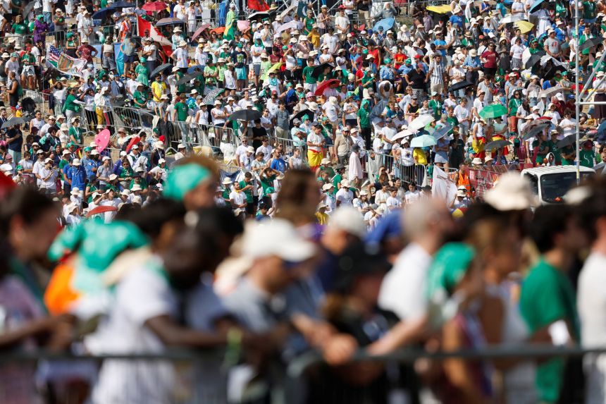 Crowds of young people attend Sunday Mass led by Pope Leo in Rome on August 3.