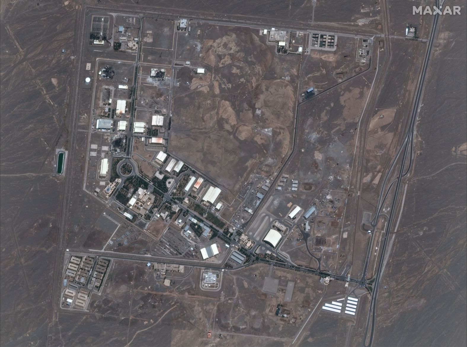 A satellite image shows Iran's Natanz Nuclear Facility Saturday after it sustained heavy damage from Israeli strikes.