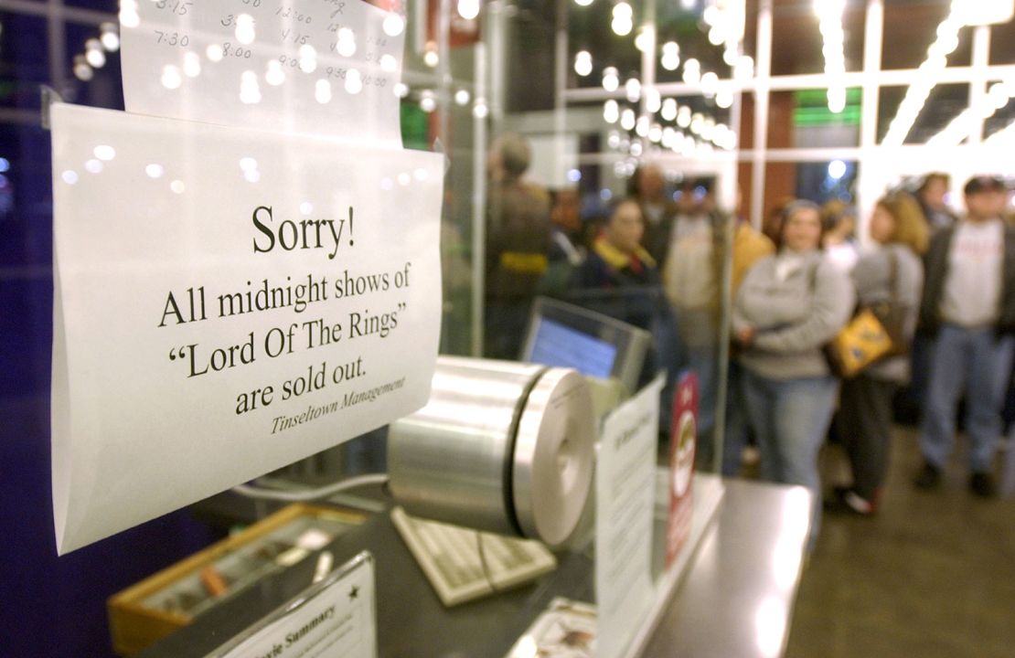 A sign in the box office tells movie goers that the first public showing of "Lord of the Rings: The Return of the King" is sold out at Tinseltown in Jackson Township, Ohio.