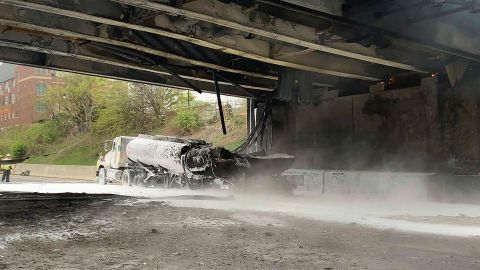 This image provided by the Norwalk Police Department shows the scene of a tanker fire on I-95 in Norwalk, Conn., Thursday, May 2, 2024. Both sides of I-95, the East Coast's main north-south highway, were shut down following the early morning crash involving a passenger car, a tractor-trailer and a tanker truck carrying 8,500 gallons (about 32,000 liters) of gasoline. (Norwalk Police Department via AP)