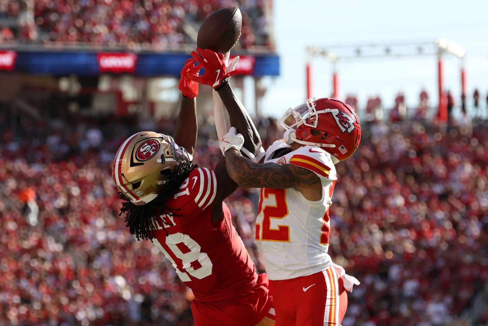 San Francisco 49ers wide receiver Chris Conley and Kansas City Chiefs cornerback Trent McDuffie vie for the ball on Sunday, October 20, in Santa Clara, California.