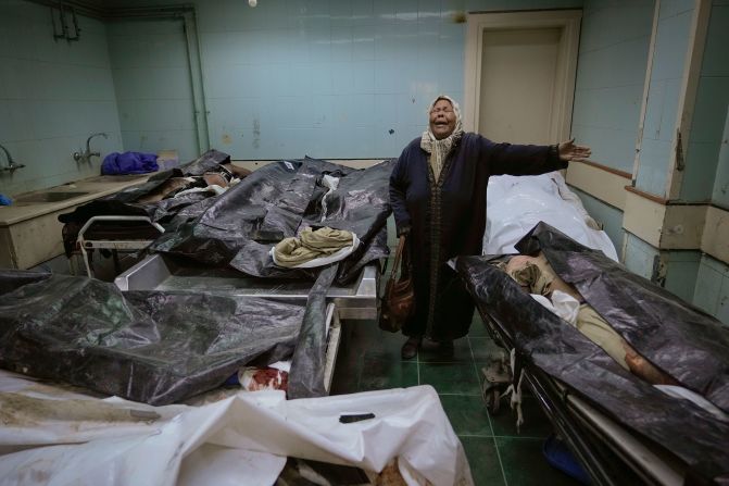 Hilala Meryeh, a 64-year-old Palestinian mother of four, weeps in the middle of the dingy identification room after finding her son's body at the Al-Mojtahed Hospital morgue in Damascus, Syria, on December 11. Many are flocking to morgues, hoping to identify loved ones who were either killed or imprisoned under Bashar al-Assad's government.