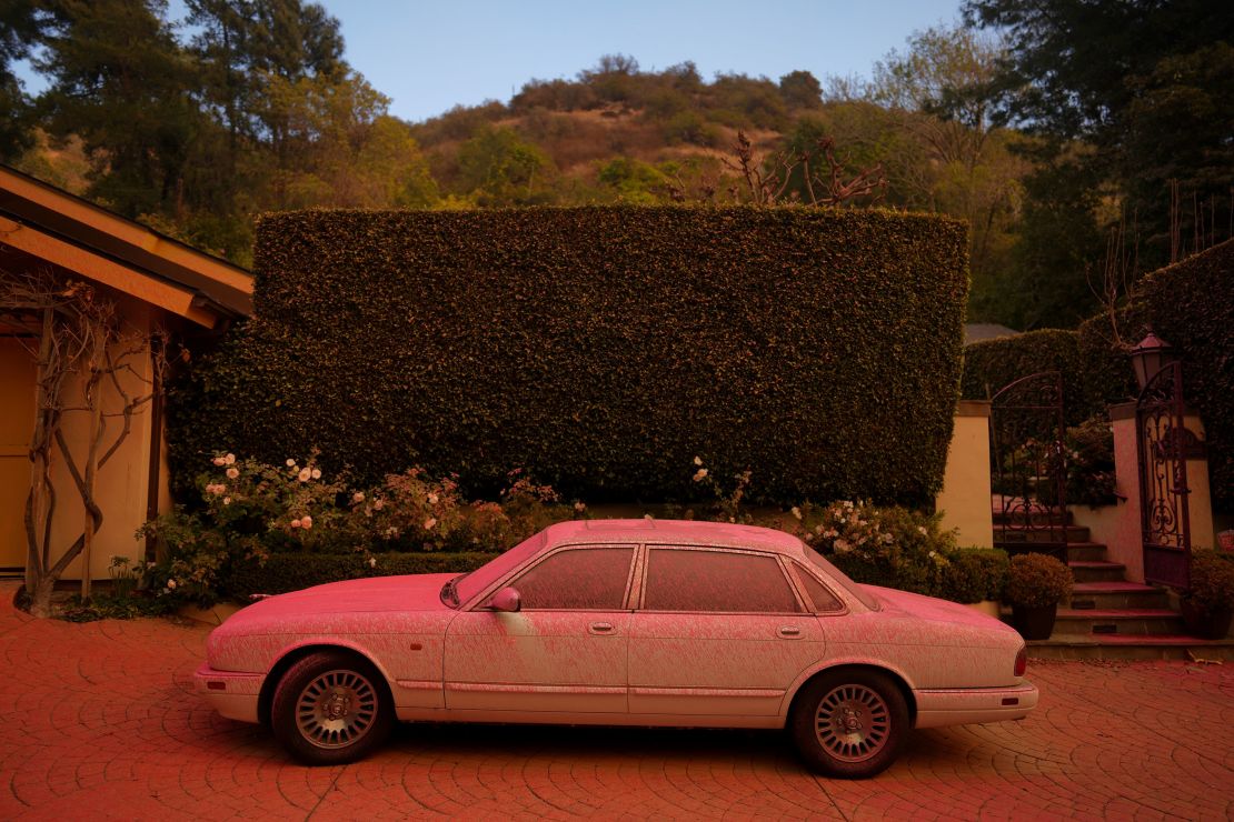 A vehicle covered in fire retardant was seen Saturday in Mandeville Canyon.