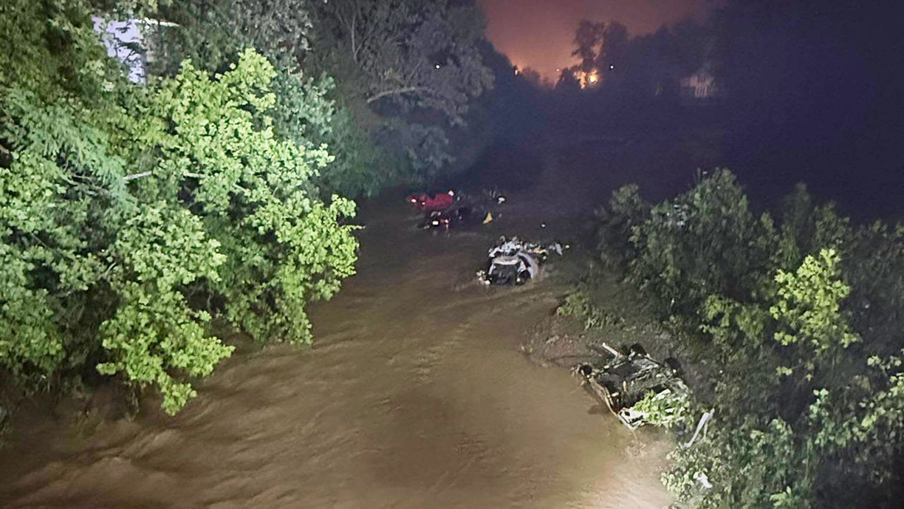 Cars sit submerged in floodwaters in Wheeling, West Virginia, on Saturday.
