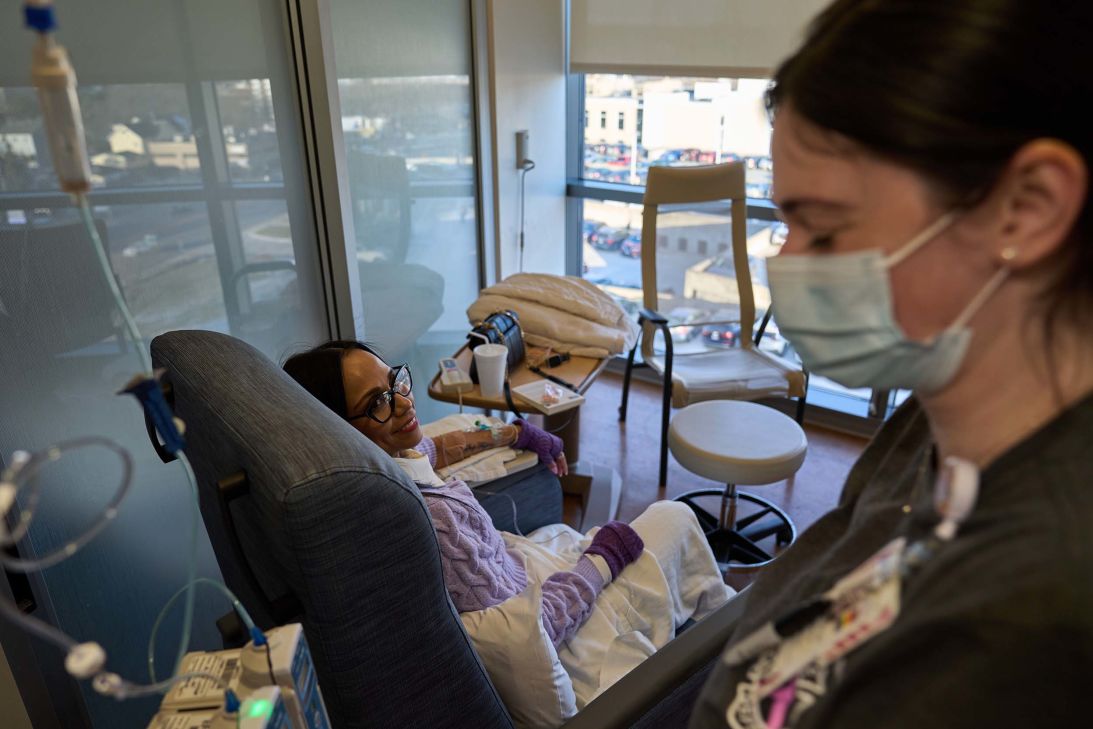 Ruth Wilson, left, whose lupus took six years to diagnose, receives her monthly lupus-focused IV treatment at UMass Memorial Medical Center.