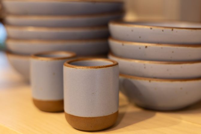 Mugs and bowls crafted by East Fork Pottery.