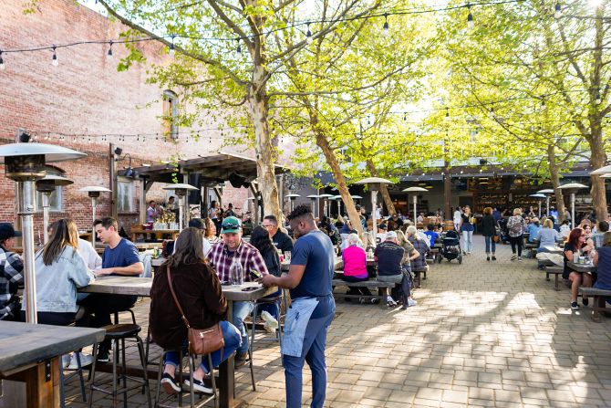 <strong>Drinking al fresco:</strong> Downtown Petaluma’s Brewsters Beer Garden serves craft beer, wine, cocktails and upscale pub grub in a large, half-covered space.