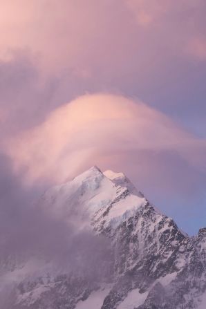 The unpredictability of nature and its fleeting beauty combine to create total awe in this photo of New Zealand'­s highest peak, Mount Cook/Aoraki at sunset.
