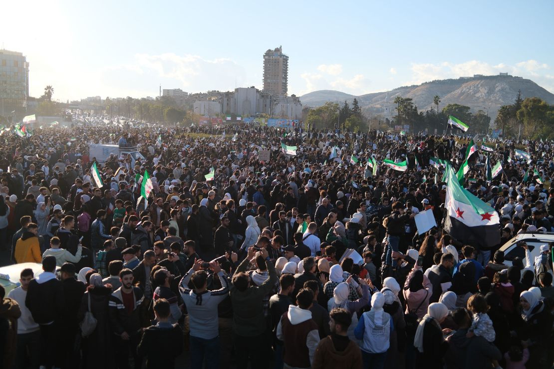 Tens of thousands of jubilant people filled the Umayyad Square in central Damascus on Friday.