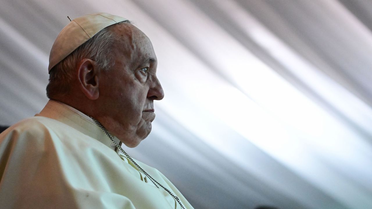 TOPSHOT - Pope Francis looks on during a meeting with internally displaced persons at the Freedom Hall in Juba, South Sudan, on February 4, 2023. - Pope Francis is making the first papal visit to South Sudan since it gained independence from Sudan in 2011 and then plunged into a brutal ethnic conflict that left the young nation divided and traumatised. (Photo by Tiziana FABI / AFP) (Photo by TIZIANA FABI/AFP via Getty Images)