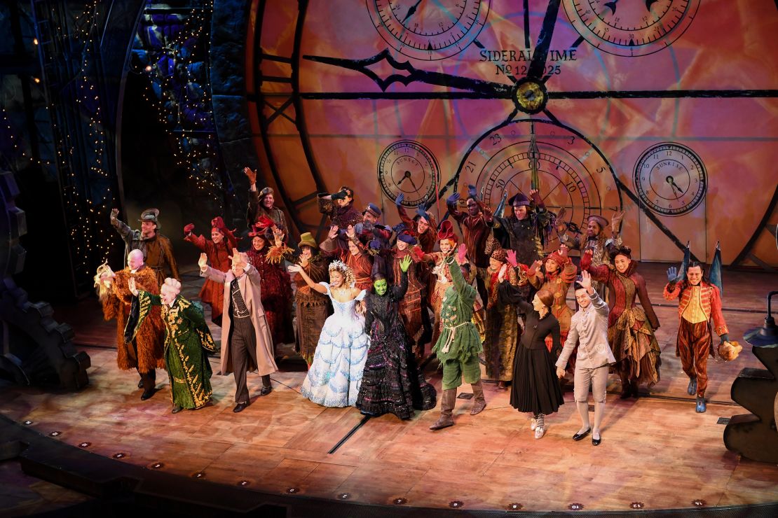 The cast of the West End production of "Wicked" take a bow in April 2023 in London.