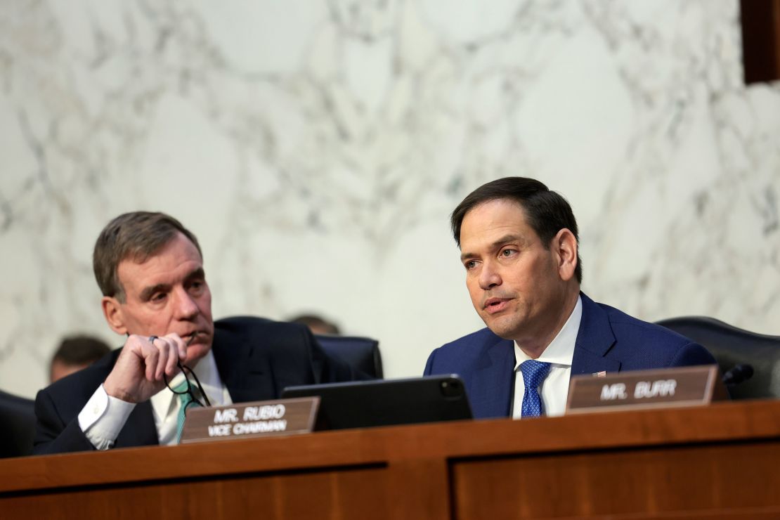 At left, Sen. Mark Warner, a Democrat from Virginia, and Rubio, at right, listen during a Senate Intelligence Committee hearing on March 10, 2022 in Washington, DC.